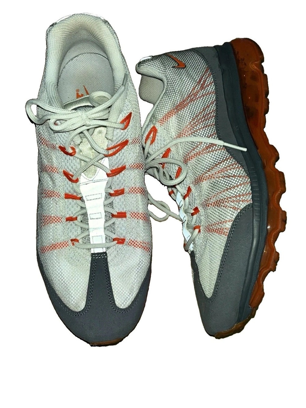 Nike Air Max 95 Dynamic Flywire in white, grey, and orange.